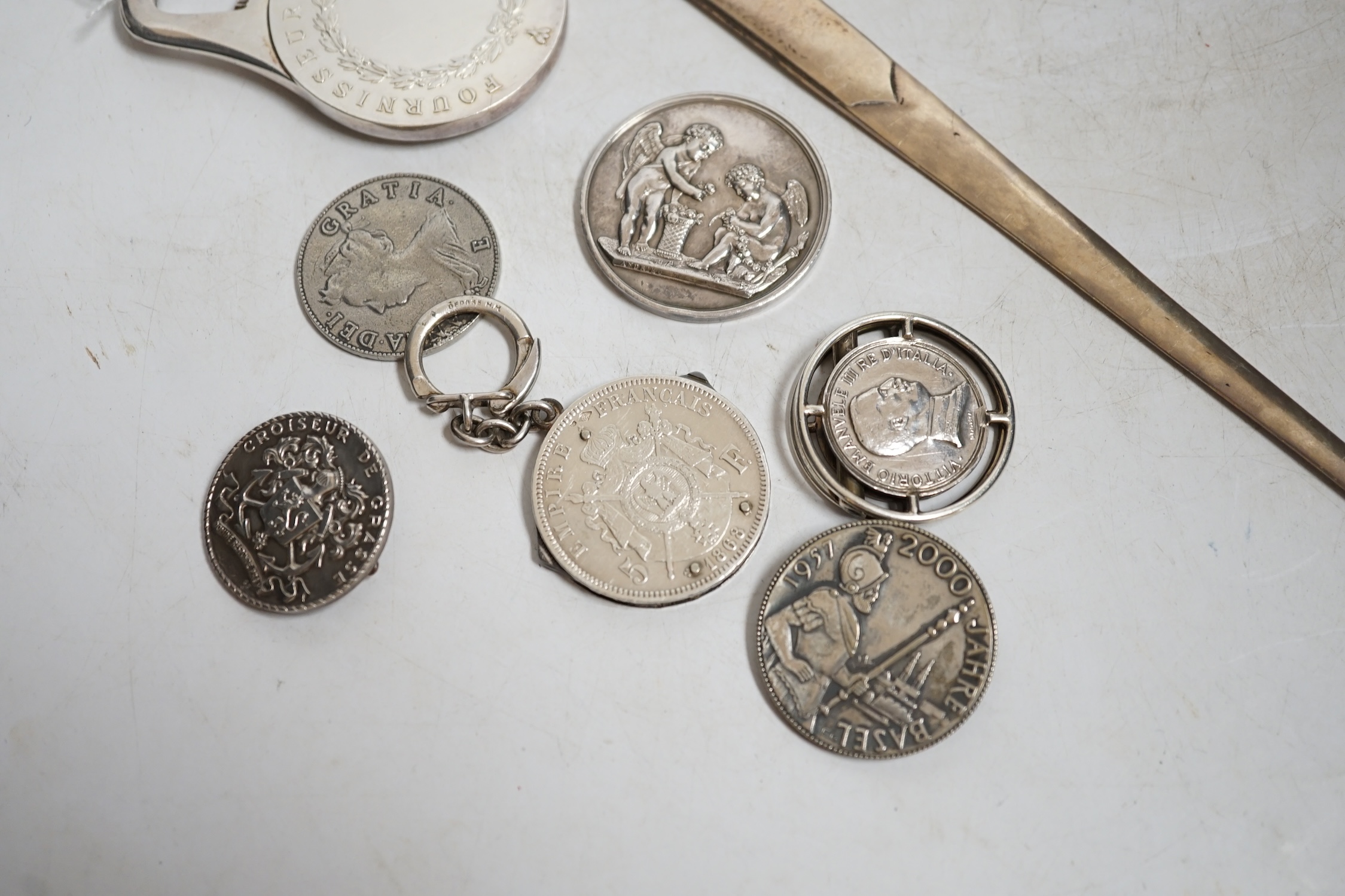 A group of mostly silver coins and a Cristofle silver plated bottle opener. Condition - fair